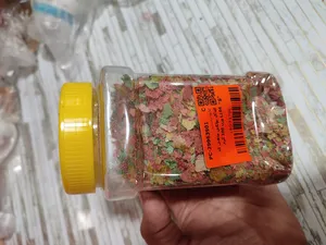 تجریه خرید غذای پولکی ماهی کد L104 وزن 100 گرم