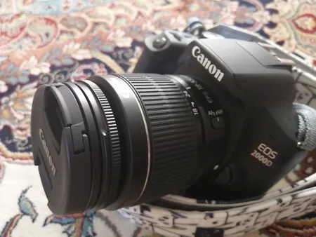 دوربین دیجیتال کانن مدل EOS 2000D به همراه لنز 18-55 میلی متر DC III