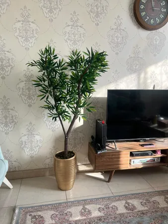 گل مصنوعی مدل بوته برگ بامبو لمسی بسته 12 عددی