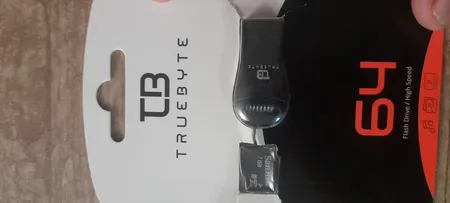 کارت حافظه microSD XC تروبایت مدل 633X-A2-V30 کلاس 10 استاندارد UHS-I U3 سرعت 95MBps ظرفیت 64 گیگابایت به همراه کارت‌خوان