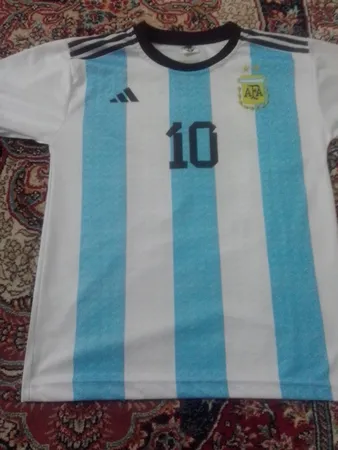 ست پیراهن و شورت ورزشی پسرانه طرح آرژانتین مدل مسی 2023