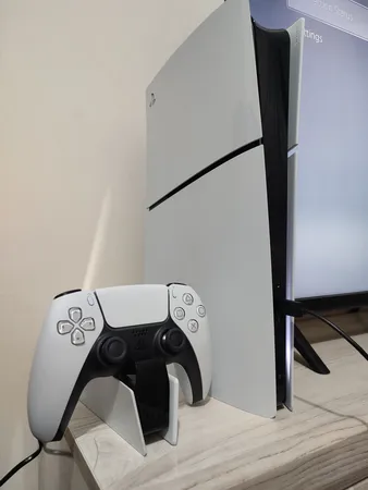 کنسول بازی سونی مدل PlayStation 5 Slim Digital Edition ظرفیت 1 ترابایت ریجن 2016B اروپا به همراه دسته اضافی و پایه شارژر