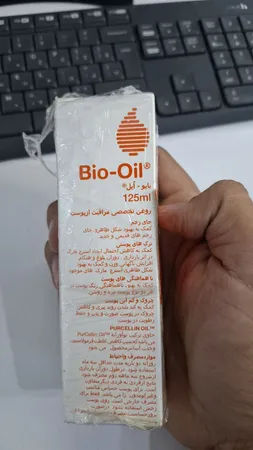 روغن صورت و بدن بایو اویل مدل ترمیم کننده و تقویت کننده حجم 200 میلی لیتر