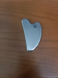 تجریه خرید ماساژور دستی صورت مدل گوآشا استیل