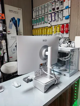 مانیتور 27 اینچ ام اس آی مدل MD2712PW، رزولوشن FullHD، پنل IPS، نرخ بروزرسانی 100 هرتز، با نسبت تصویر 16:9، دارای اسپیکر داخلی، دارای پورت HDMI و USB-C و خروجی هدفون