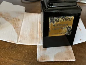 تجریه خرید ادوپرفیوم مردانه فراگرنس پرشیا 116 مدل تام فورد توسکان لدر حجم 100 میلی‌لیتر