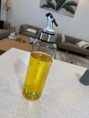 ظرف روغن مدل سر ریز دار 500