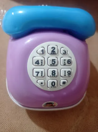 قلک طرح اسباب بازی تلفن و ماشین