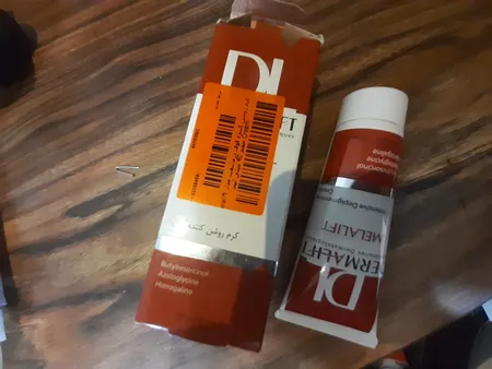 کرم روشن کننده صورت درمالیفت مدل Melalift مناسب انواع پوست حجم 40 میلی لیتر