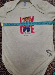 تجریه خرید ست بادی آستین بلند و شلوار نوزادی نیل کوک مدل Olive-Ted مجموعه 2 عددی