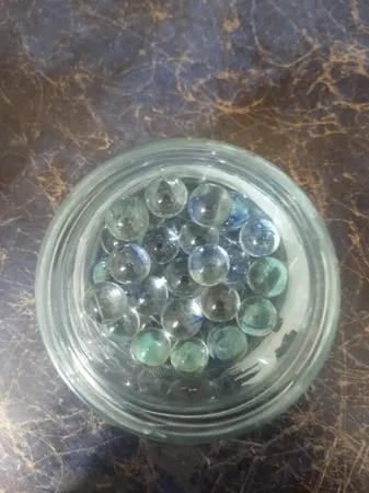 تیله شیشه ای مداد چوبی مدل چند پر بسته 50 عددی