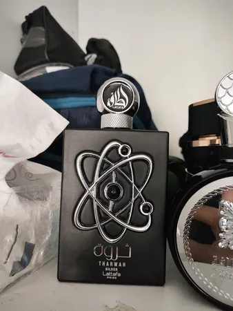 ادو پرفیوم مردانه لطافه مدل ثروة حجم 100 میلی لیتر