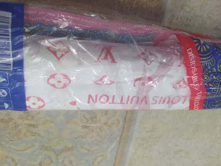 سفره یکبار مصرف طرح گل دار رول 50 متری مجموعه 2 عددی