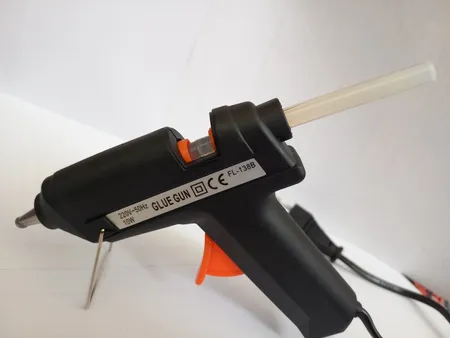 دستگاه چسب تفنگی جانسون مدل FL-138B به همراه یک عدد چسب حرارتی جانسون بصورت رایگان