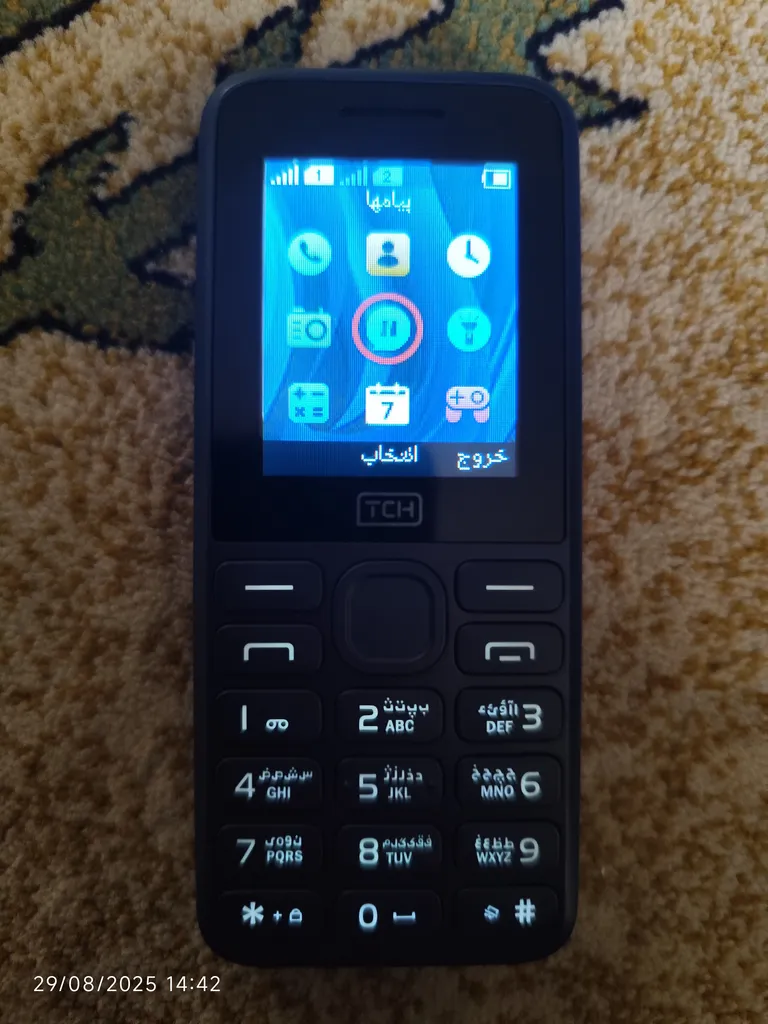 گوشی موبایل تی سی اچ مدل ARC دو سیم‌کارت ظرفیت 4 مگابایت