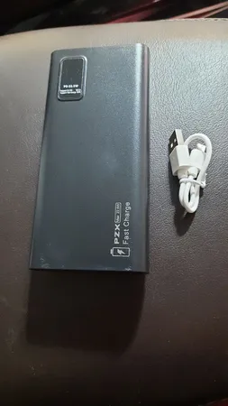 پاوربانک پی زد ایکس مدل V83 Fast Charge 22.5W ظرفیت 20000 میلی آمپر ساعت