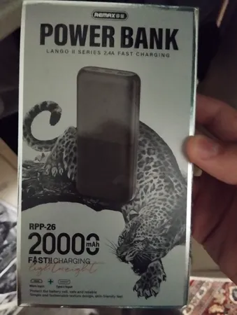 پاوربانک 12 وات ریمکس مدل RPP-26 ظرفیت 20000 میلی آمپر ساعت