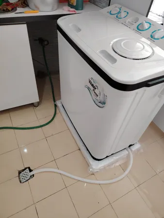 ماشین لباسشویی نیمه اتوماتیک پاکشوما مدل PTN 9604i AJ ظرفیت 9.6 کیلوگرم
