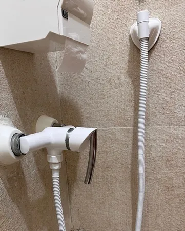 شلنگ توالت چارسو مدل ریز بافت برنجی WH