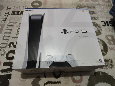 کنسول بازی سونی مدل PlayStation 5 ظرفیت 825 گیگابایت ریجن 1200 آسیا به همراه دسته اضافی و پایه شارژر و هدست