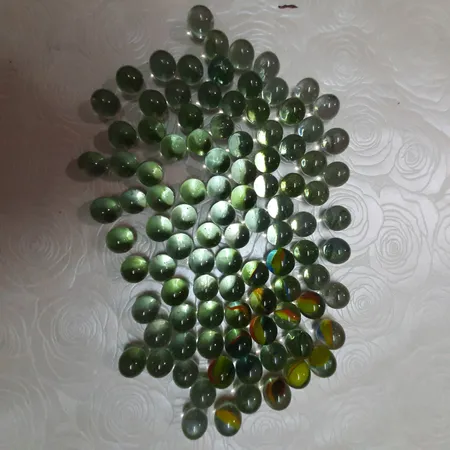 تیله شیشه ای مداد چوبی مدل چند رنگ بسته 100 عددی