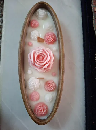 شمع دست ساز طرح قایق گل مدل T1043