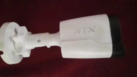 دوربین مداربسته تحت شبکه ان آی کی مدل وارم لایت IP B180_4MP