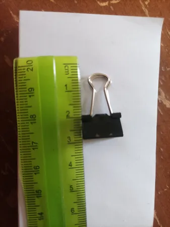 گیره کاغذ دینگ لی مدل DL.0006 سایز 15 میلی متر بسته 12 عددی