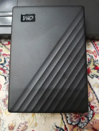هارد اکسترنال وسترن دیجیتال مدل My Passport ظرفیت پنج ترابایت دارای رابط USB Type-A 3.2