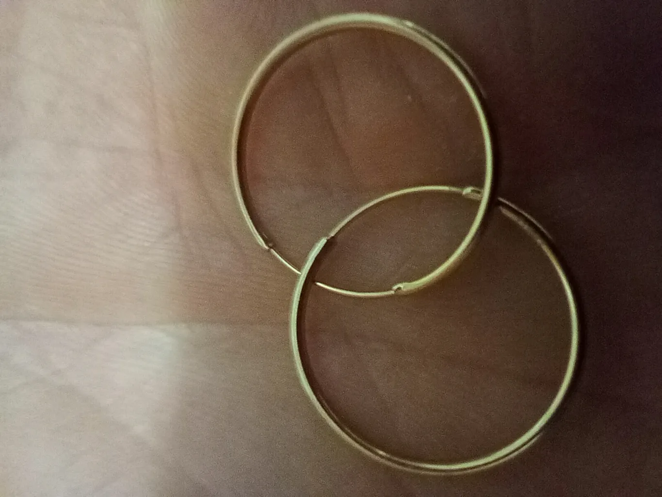 گوشواره طلا کم اجرت 18 عیار زنانه نوا گلد مدل حلقه ای گرد ساده 01