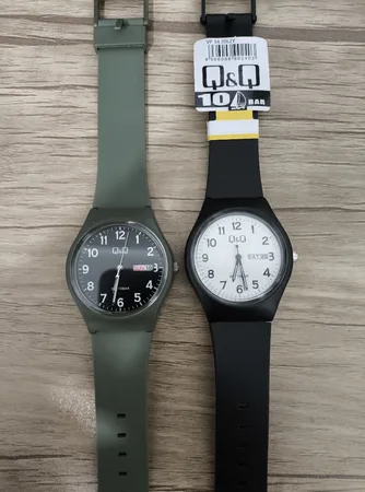 ساعت مچی عقربه ای زنانه و مردانه کیو اند کیو مدل A212J003Y