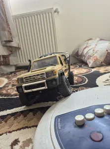 تجریه خرید ماشین بازی کنترلی ام ان مدل وانت تویوتا لندکروز