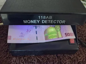 تجریه خرید دستگاه تشخیص اصالت اسکناس مدل برقی AD-118AB