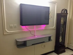 تجریه خرید میز تلویزیون دیواری مدل DLF84L