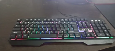 کیبورد گیمینگ تسکو مدل TK 8021L با حروف فارسی، سوییچ ممبران، Full-Size، نورپردازی RGB LED