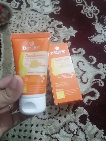کرم ضد آفتاب تاپ شاپ مدل 50 حجم 50 میلی لیتر بسته 2 عددی