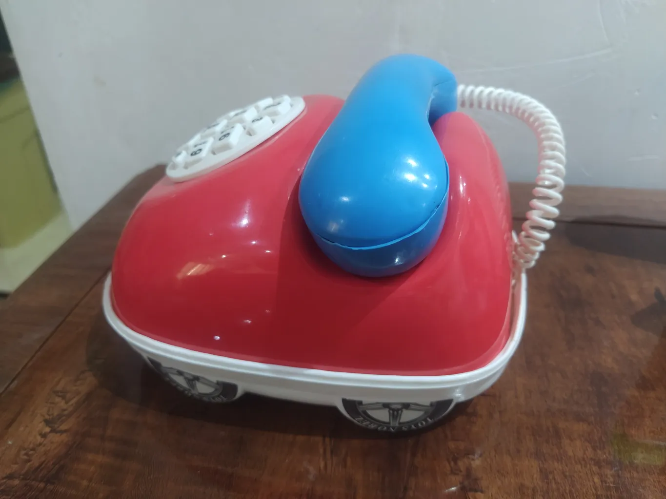 قلک طرح اسباب بازی تلفن و ماشین