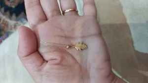 تجریه خرید آویز گردنبند طلا 18 عیار زنانه میو گلد طرح برگ کد N1824