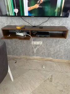 تجریه خرید میز تلویزیون دیواری مدل  DLF88L