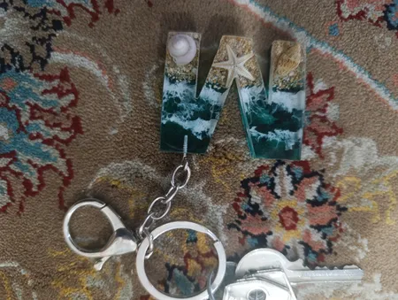 جاکلیدی مدل رزینی طرح دریا حرف M