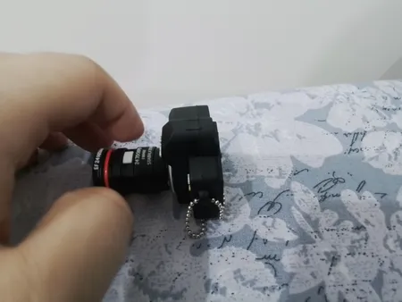 فلش مموری طرح دوربین عکاسی نیکون مدل Ul-CN02 ظرفیت 64 گیگابایت