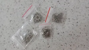 تجریه خرید گردنبند مدل ماه و خورشید و ستاره و زحل بسته چهار عددی