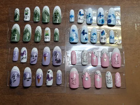 برچسب لنز ناخن مدل فانتزی کیوت کد N46-72 مجموعه 9 عددی