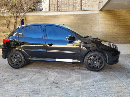 قالپاق چرخ تی پی ای مدل ِP207-B04 سایز 14 اینچ مناسب برای پژو 207 بسته 4 عددی