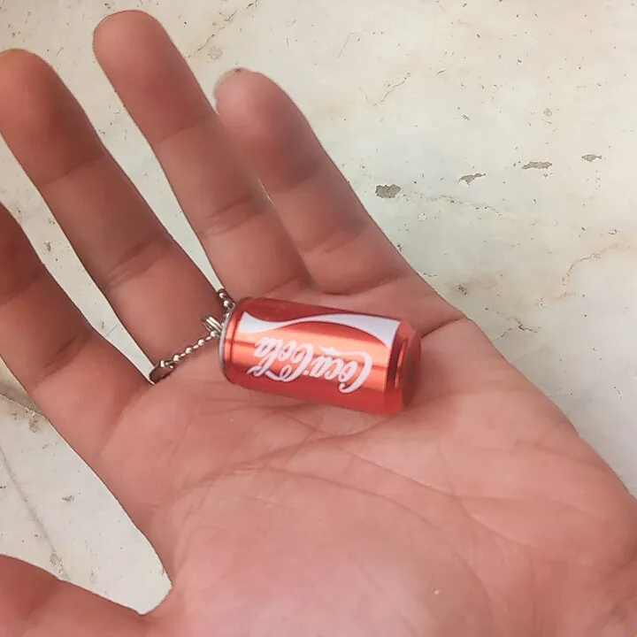 فلش مموری طرح کوکاکولا مدل UM024 ظرفیت 32 گیگابایت