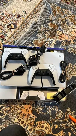 کنسول بازی سونی مدل PlayStation 5 Slim Digital Edition ظرفیت 1 ترابایت ریجن 2016B اروپا به همراه دسته اضافی و پایه شارژر