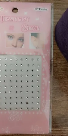 پیرسینگ بینی زنانه مدل چسبی طرح الماس کد nos110 بسته 100 عددی