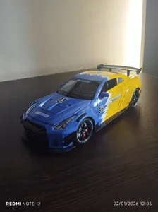 تجریه خرید ماشین بازی چه ژی مدل نیسان طرح GTR موزیکال دودزا کد CZ128ADT