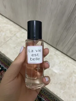 عطر جیبی زنانه نیو پرستیژ کالر مدل La Vie Est Belle حجم 35 میلی لیتر
