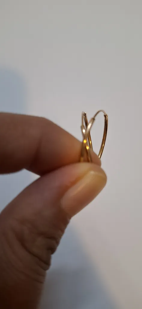 گوشواره طلا کم اجرت 18 عیار زنانه نوا گلد مدل حلقه ای گرد ساده 01